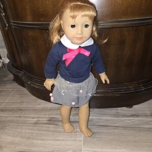 Doll with Navy Sweater and Gray Skirt